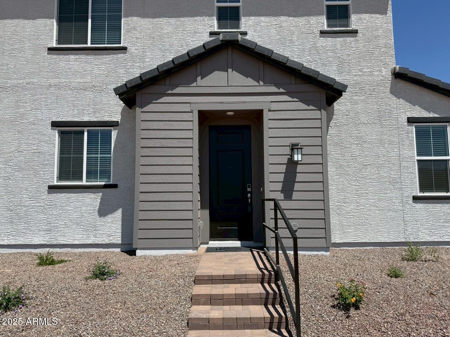 2443 West Rowel Road Phoenix, AZ 85085 - Photo 5 of 19 a front view of a house with a garage