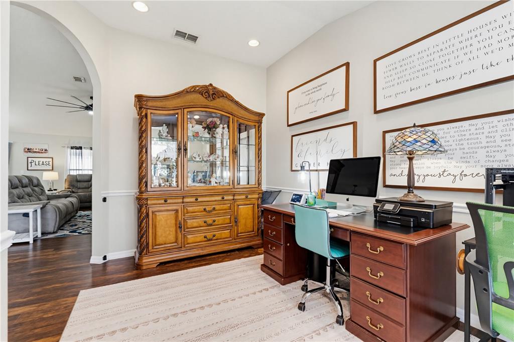 3497 Chadwick Avenue Spring Hill, FL 34609 - Photo 18 of 47 a bedroom with a workspace