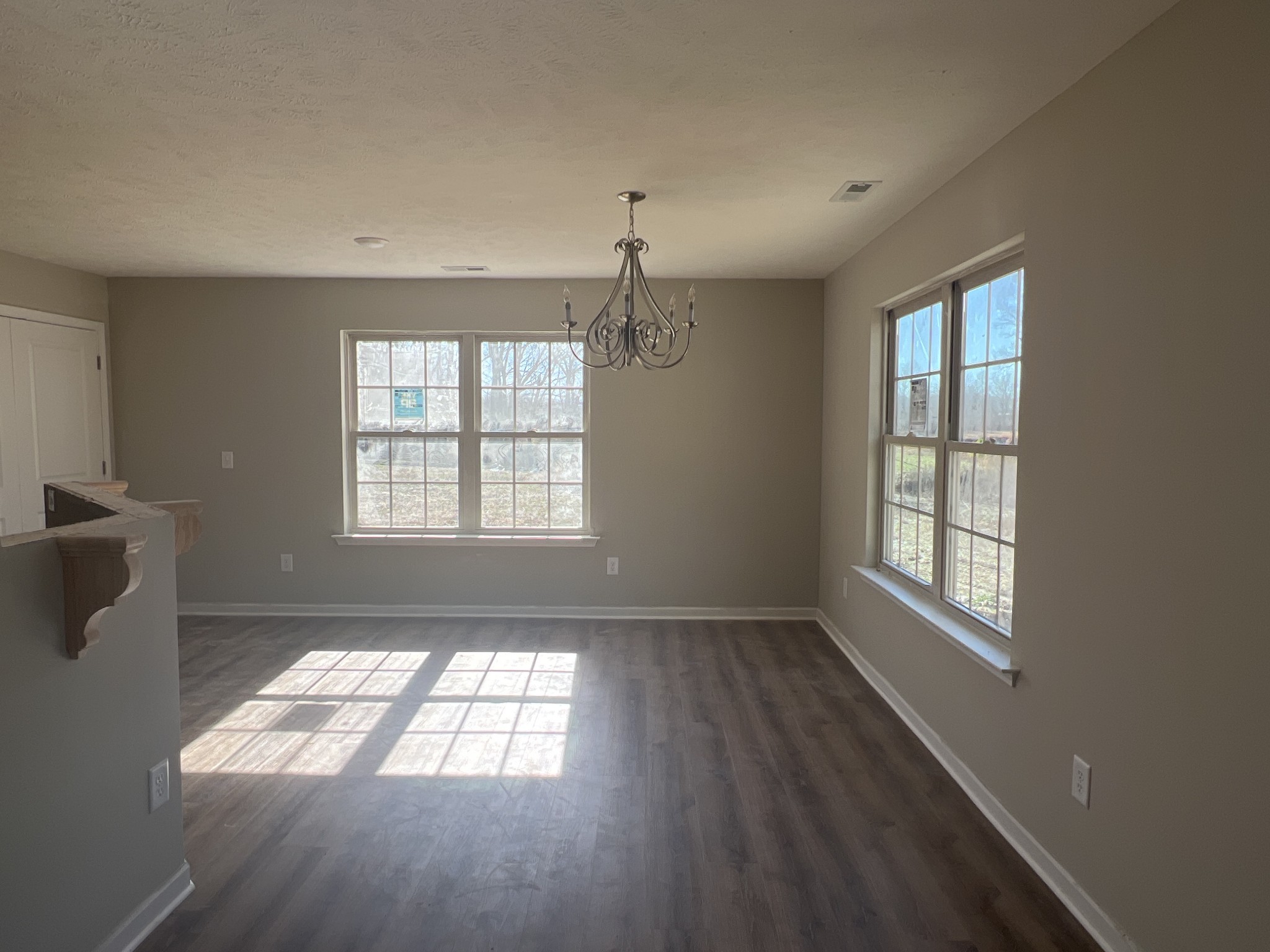 219 Timber Circle Manchester, TN 37355 - Photo 4 of 8 wooden floor in an empty room with a window