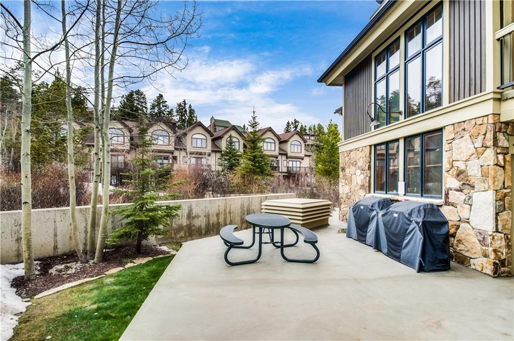 655 4 O Clock Road, Unit 116 Breckenridge, CO 80424 - Photo 22 of 25 a view of a two chairs in the patio in front of a house