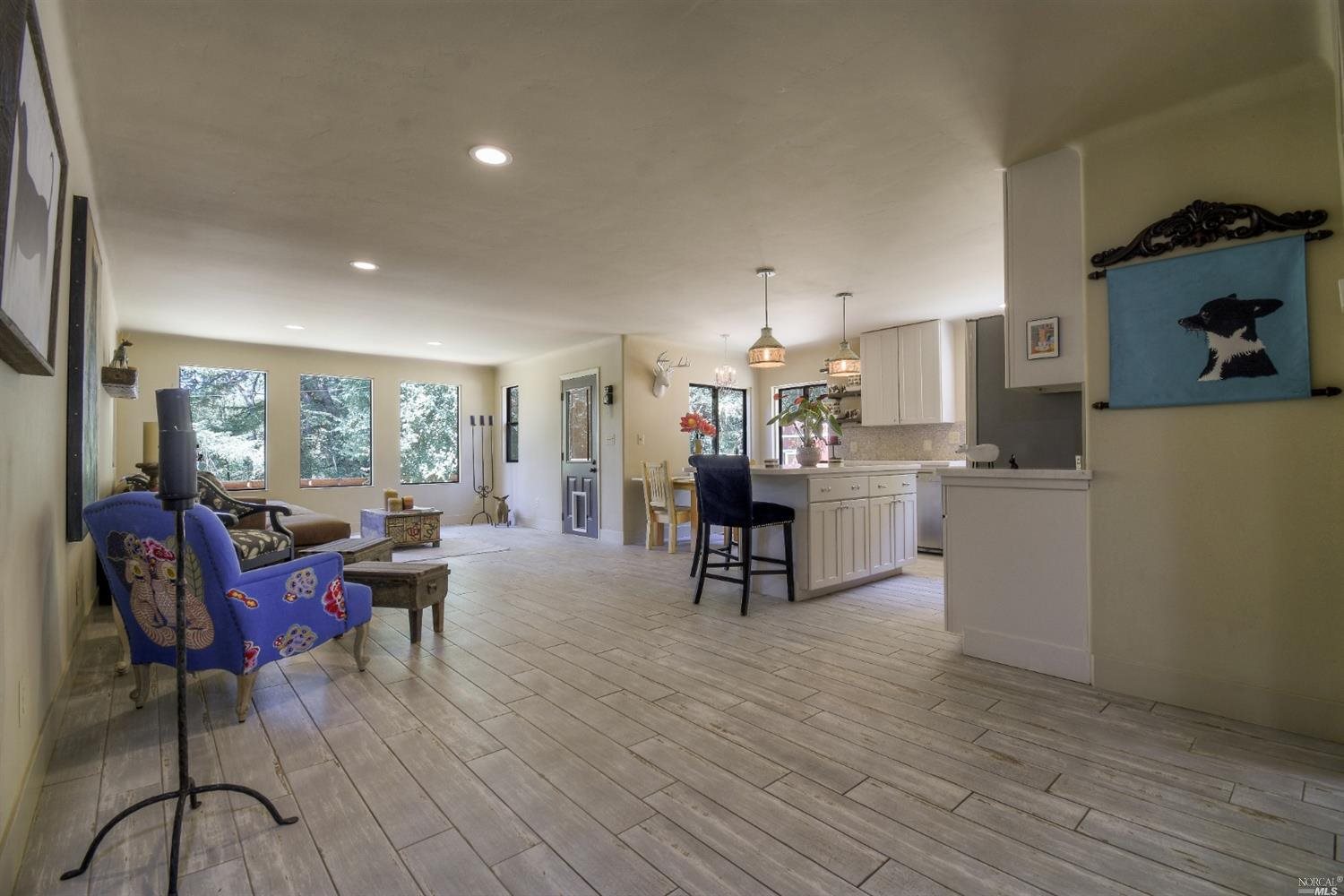 7577 Covey Road Forestville, CA 95436 - Photo 1 of 1 House feature central heat and two wall mounted energy efficient powerful Air Conditioning units. Smooth living room walls beautifully curve to the ceiling.