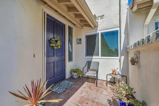 a front view of a house with patio