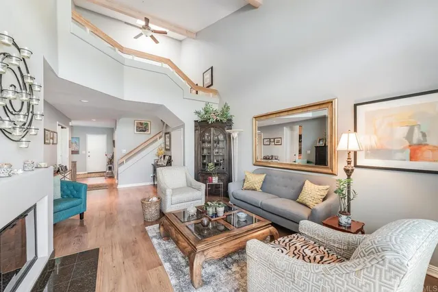 a living room with furniture and a table