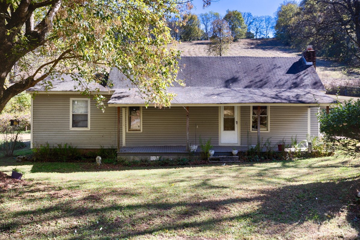 1121 Rolin Hollow Road Ardmore, TN 38449 - Photo 23 of 46 a front view of a house with a yard
