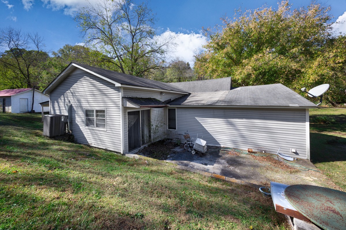 1121 Rolin Hollow Road Ardmore, TN 38449 - Photo 26 of 46 a view of a house with a yard