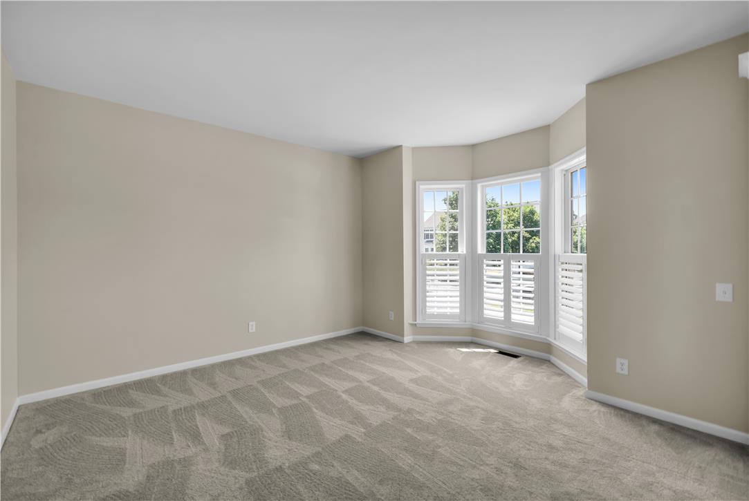 1709 Travers Road Breinigsville, PA 18031 - Photo 9 of 55 Sun-filled bay windows and soft carpeting define this inviting living space.