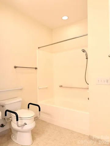 a spacious bathroom with a double vanity sink mirror and double