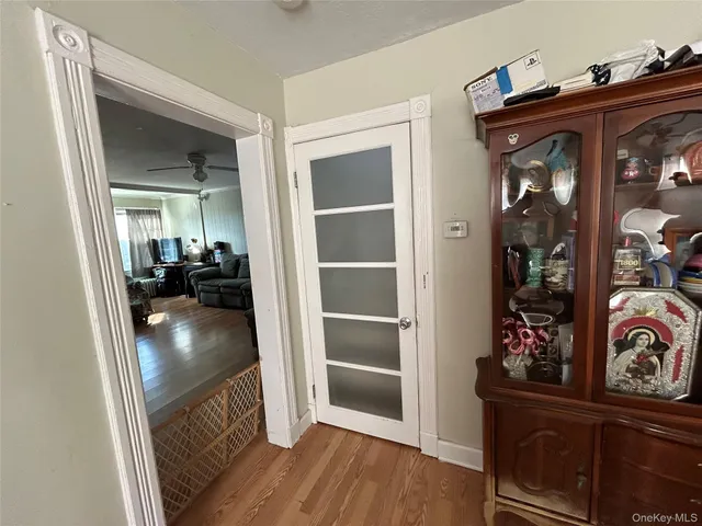 a view of living room and wooden floor