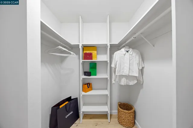 a room with window and cabinet