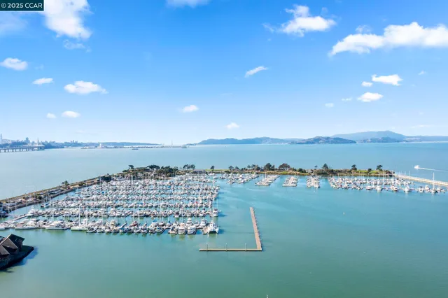 a view of a lake with tall building in ocean