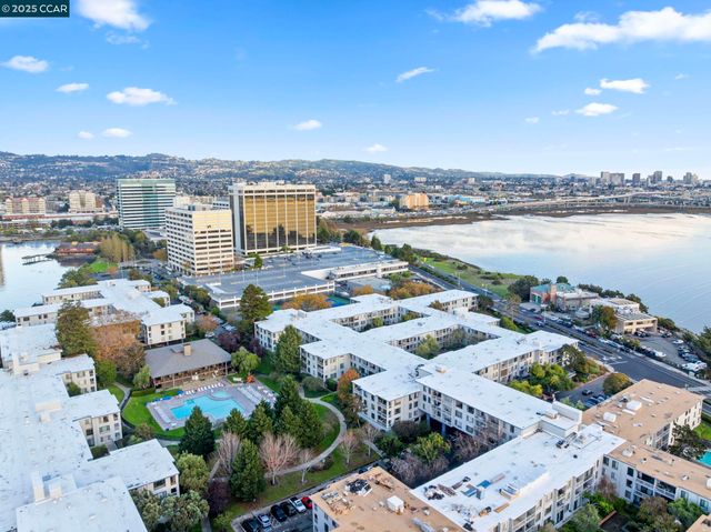 a view of a swimming pool and deck