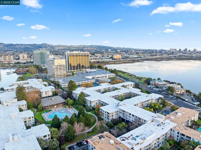 a view of a swimming pool and deck