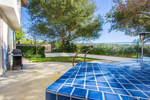 a view of an outdoor space with a swimming pool