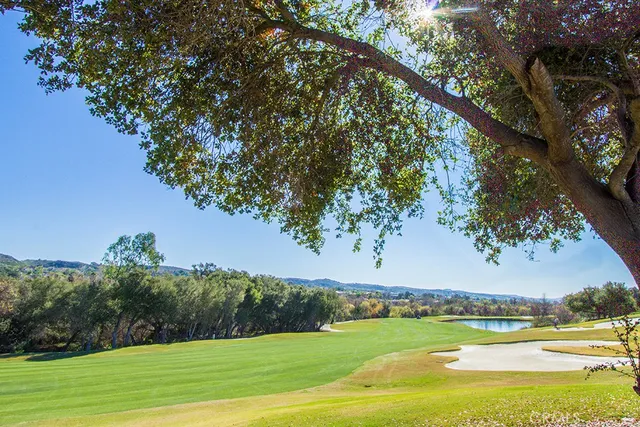 a view of a lake with a big yard