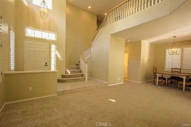 a view of livingroom with furniture and windows