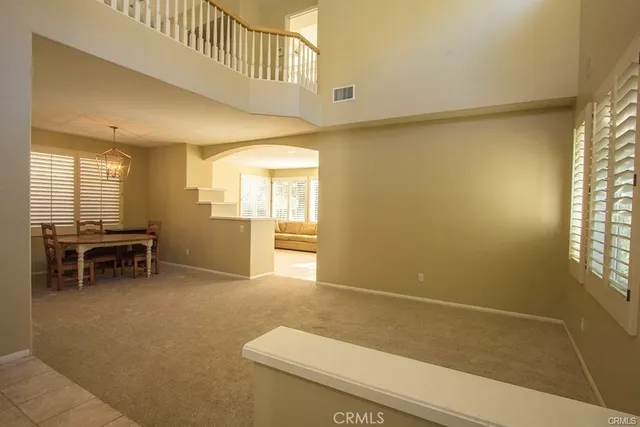 a view of livingroom with furniture and windows