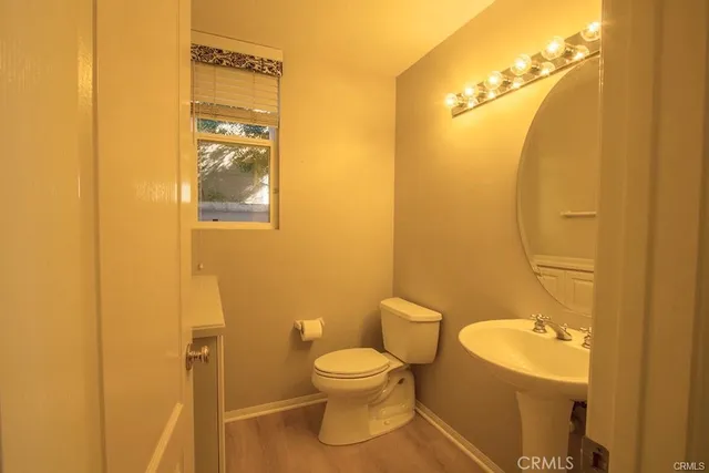 a bathroom with a toilet and a sink