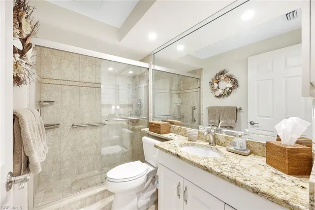 a bathroom with a toilet and a sink