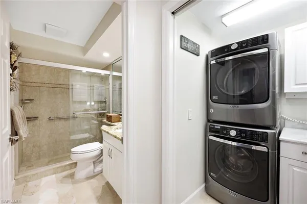 a view of a chairs and table in patio