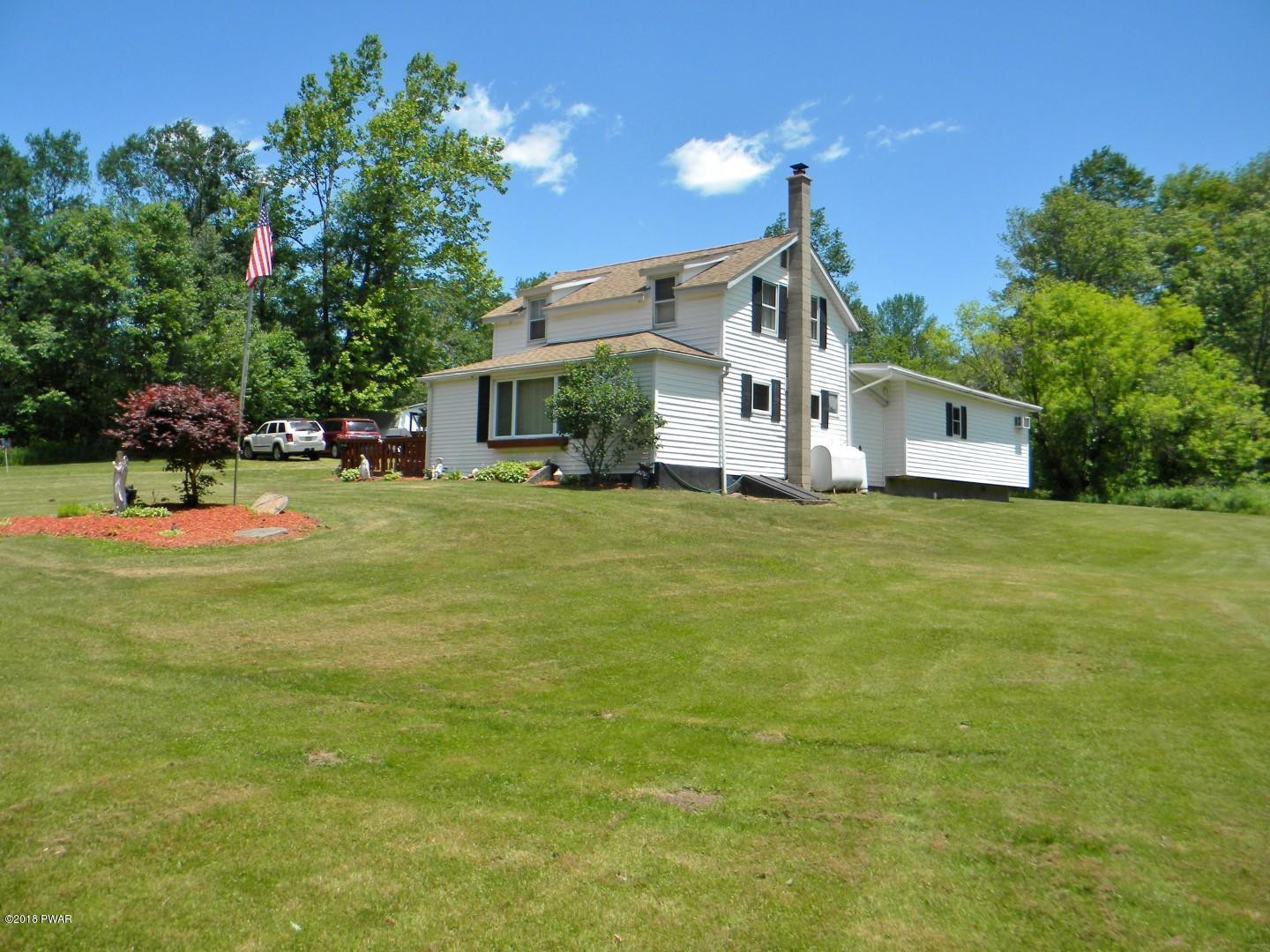 27 Plank Road Beach Lake, PA 18405 - Photo 4 of 44 SIDE VIEW OF HOME AND PROPERTY