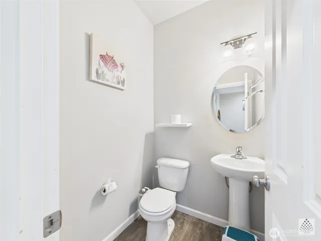 a bedroom with a bed and lamp