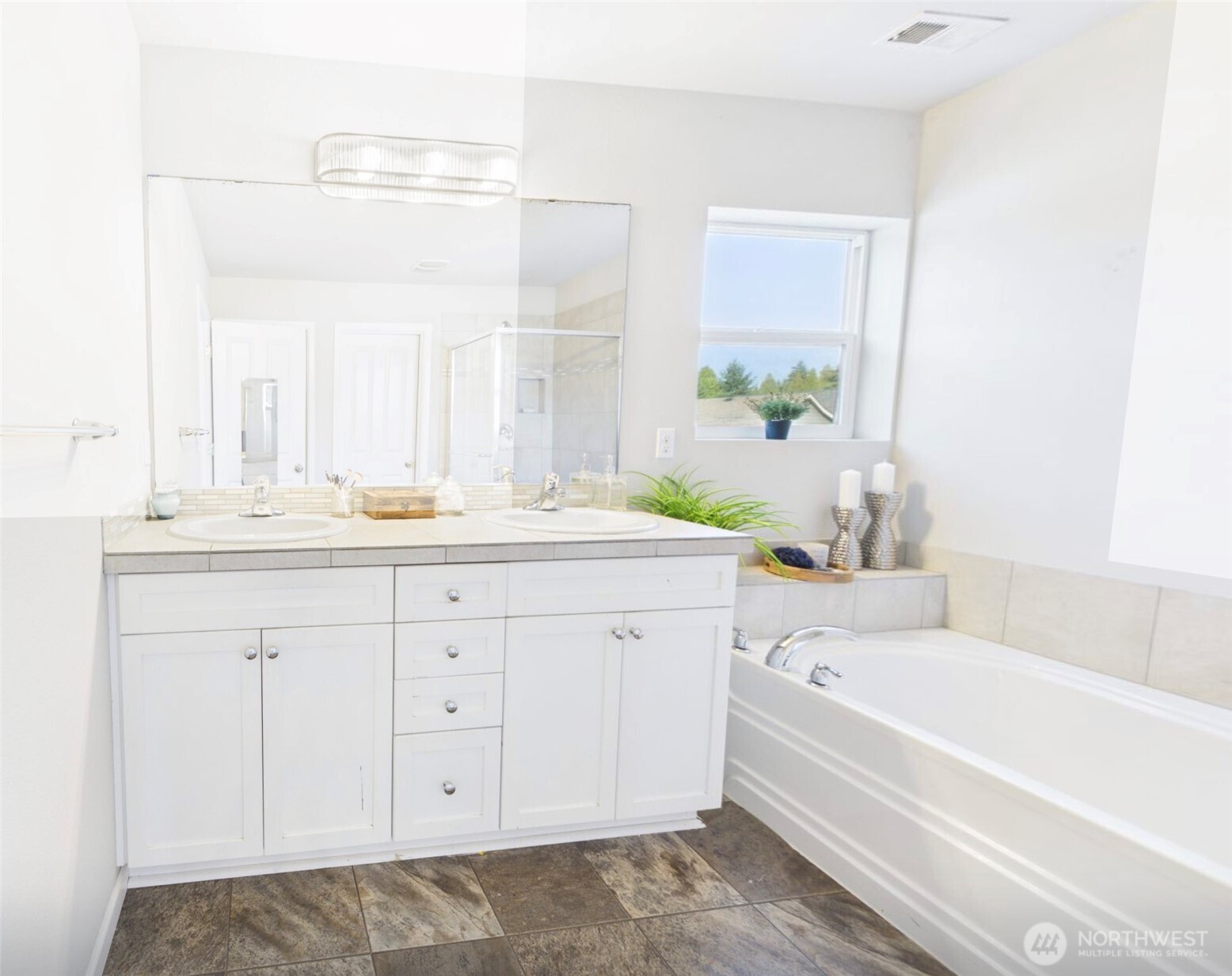 3625 202nd Pl S East Bothell, WA 98012 - Photo 16 of 31 a bathroom with a bathtub sink and mirror