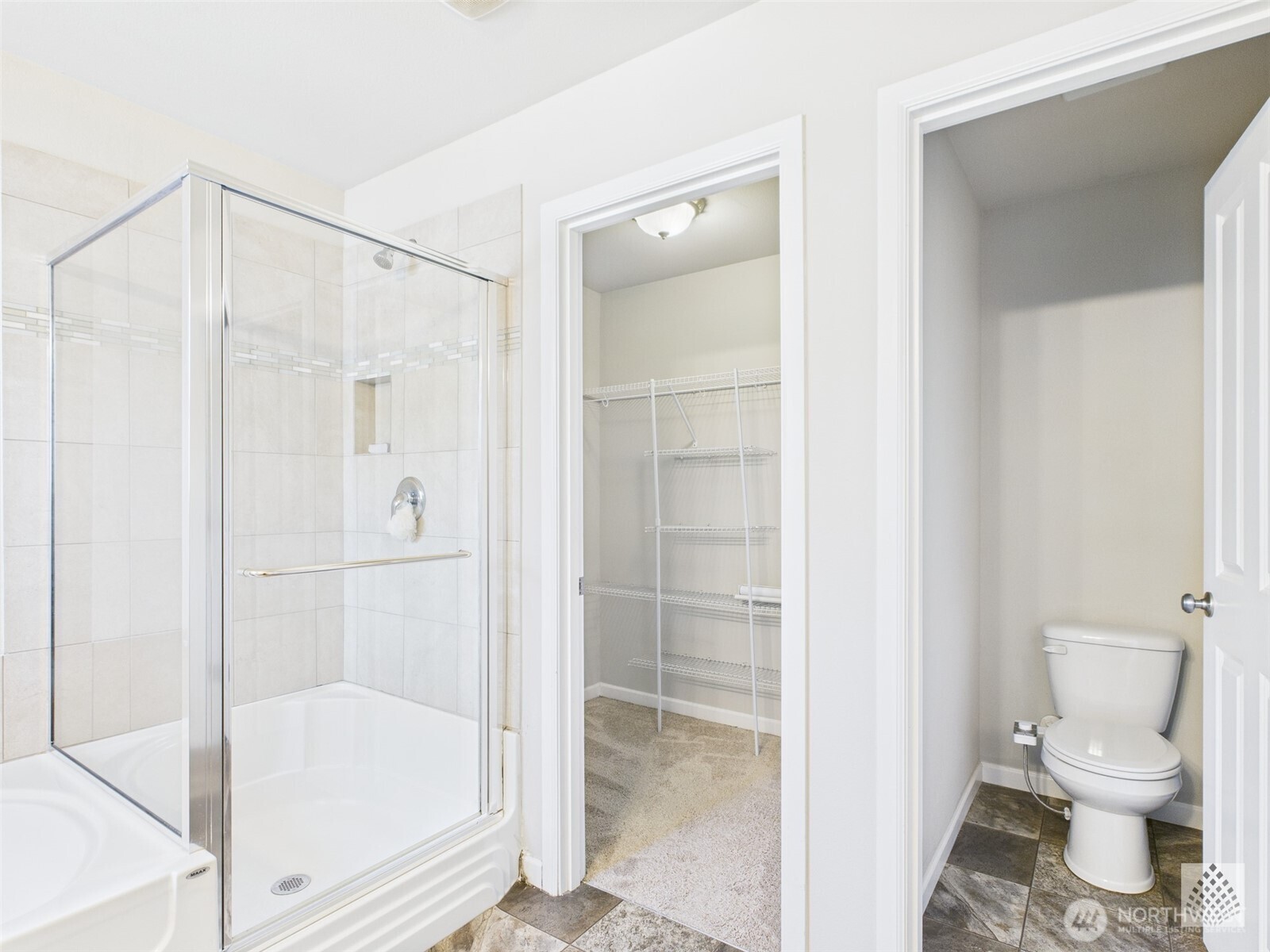 3625 202nd Pl S East Bothell, WA 98012 - Photo 17 of 31 a bathroom with a shower and a toilet