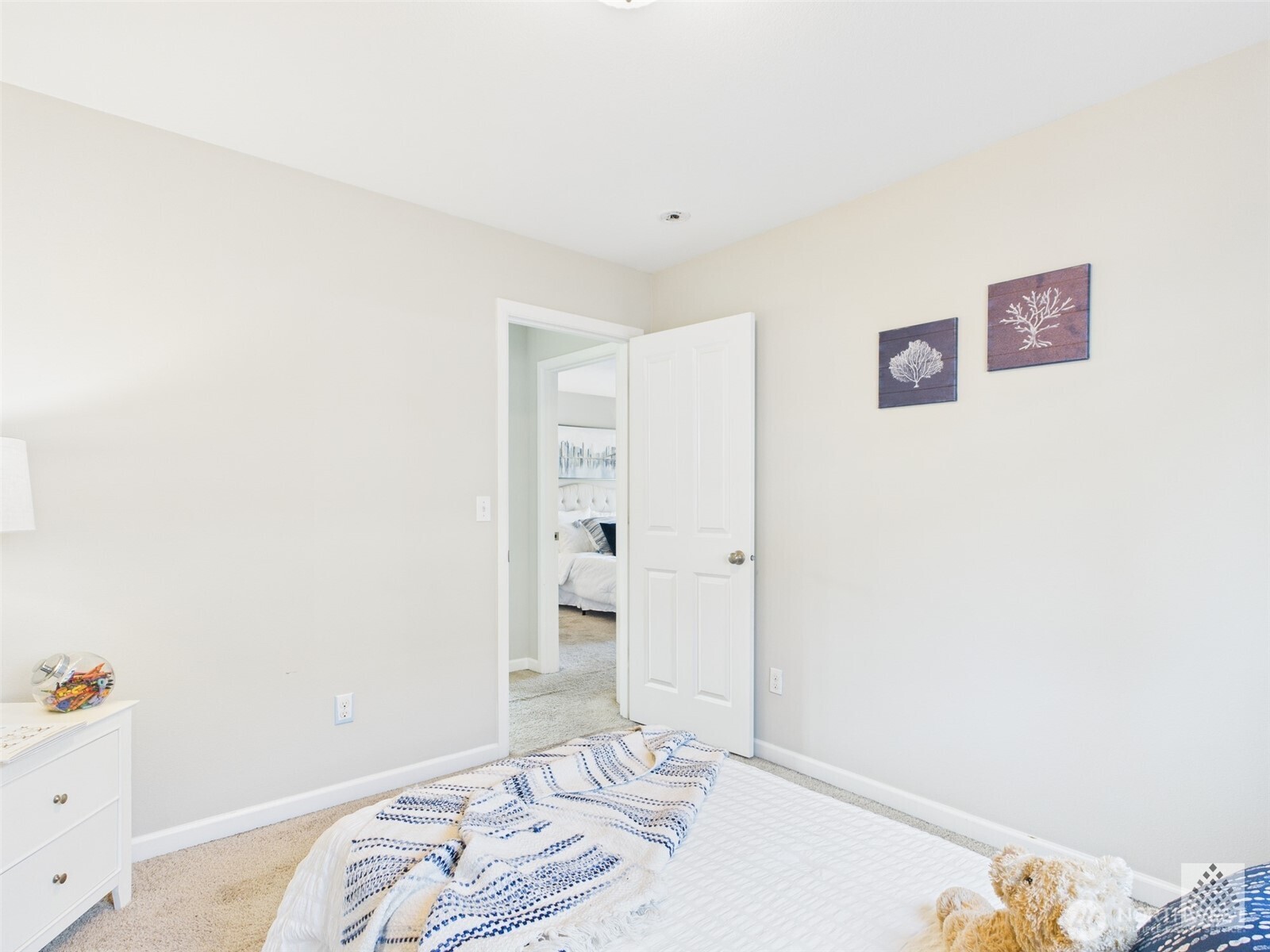 3625 202nd Pl S East Bothell, WA 98012 - Photo 19 of 31 a bedroom with a bed and a cabinets