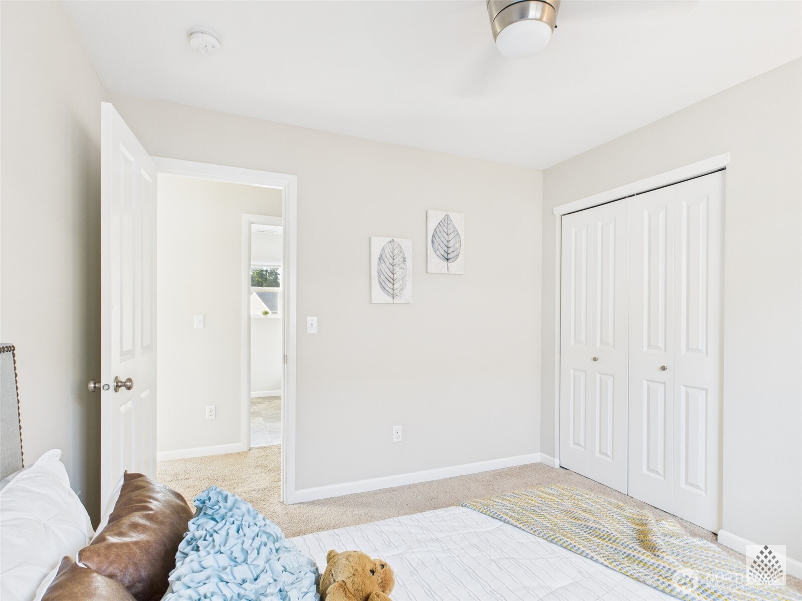 3625 202nd Pl S East Bothell, WA 98012 - Photo 23 of 31 a bedroom with a bed and a couch