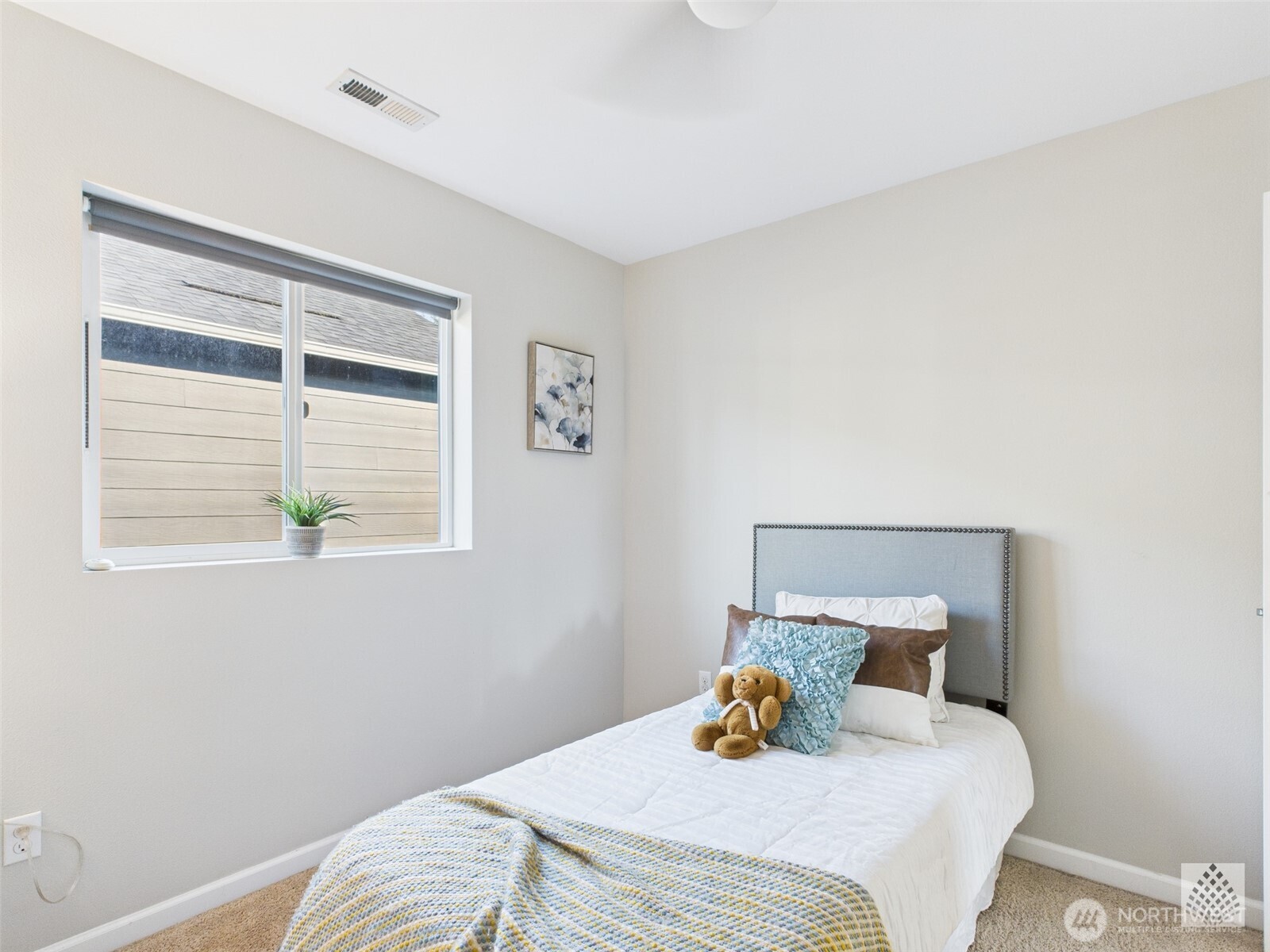 3625 202nd Pl S East Bothell, WA 98012 - Photo 24 of 31 a bedroom with a bed and a window