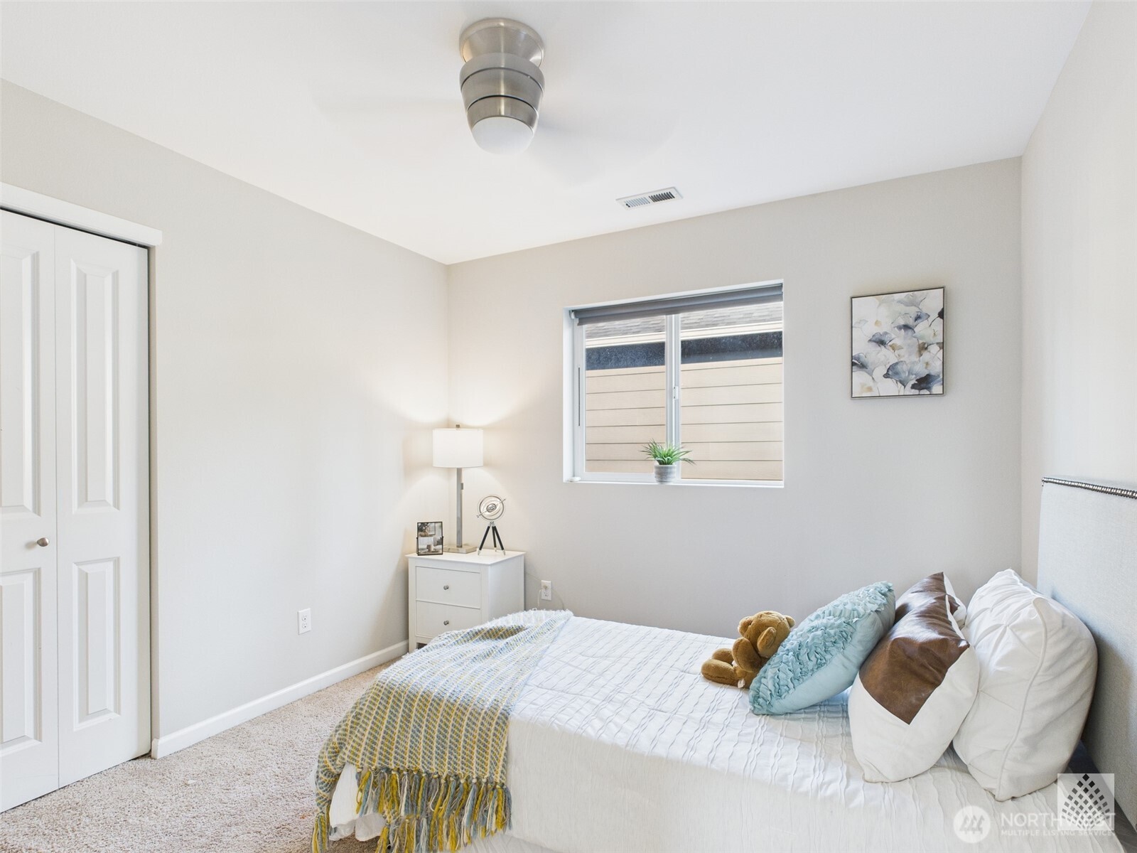 3625 202nd Pl S East Bothell, WA 98012 - Photo 25 of 31 a bedroom with a bed and a window