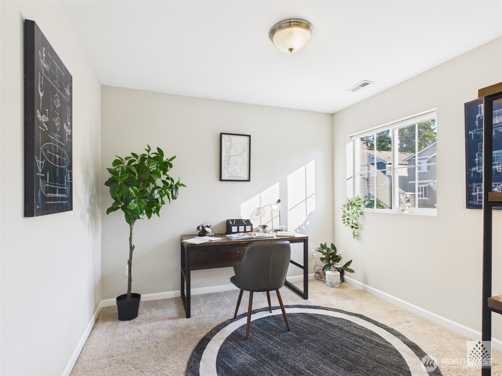 3625 202nd Pl S East Bothell, WA 98012 - Photo 27 of 31 a living room with furniture and a potted plant