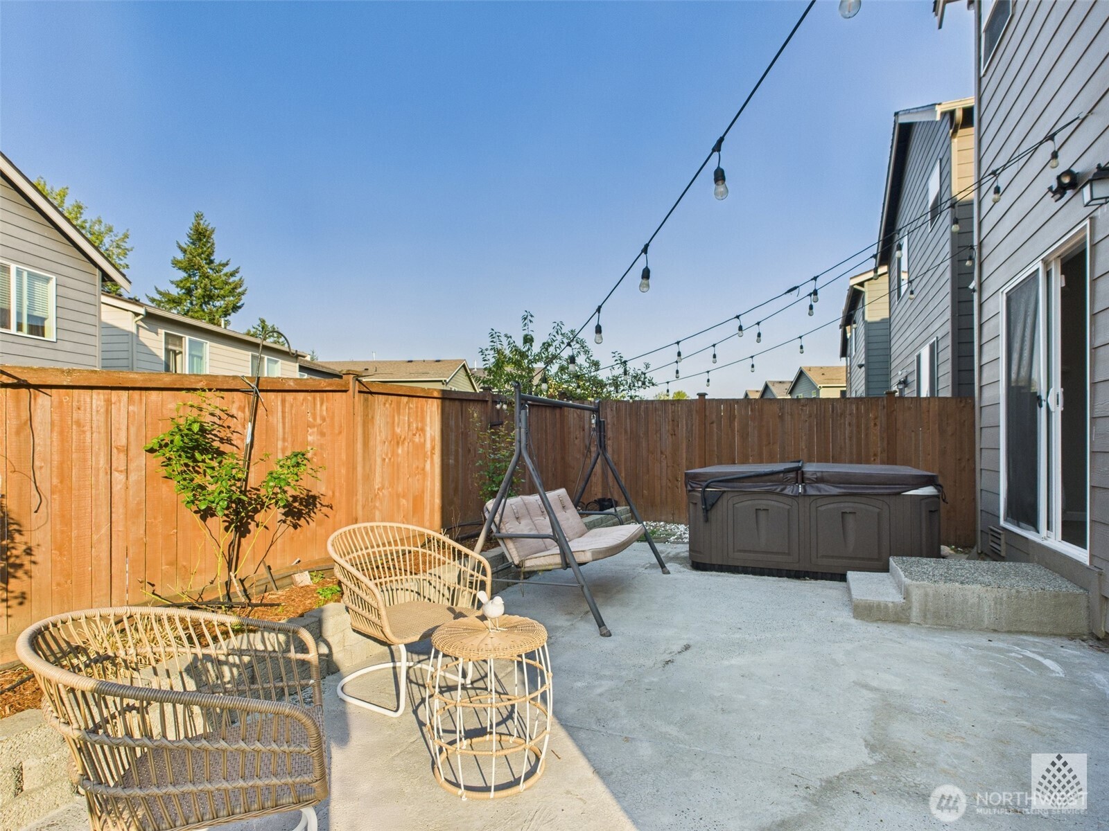 3625 202nd Pl S East Bothell, WA 98012 - Photo 29 of 31 a building outdoor space with patio furniture and potted plants