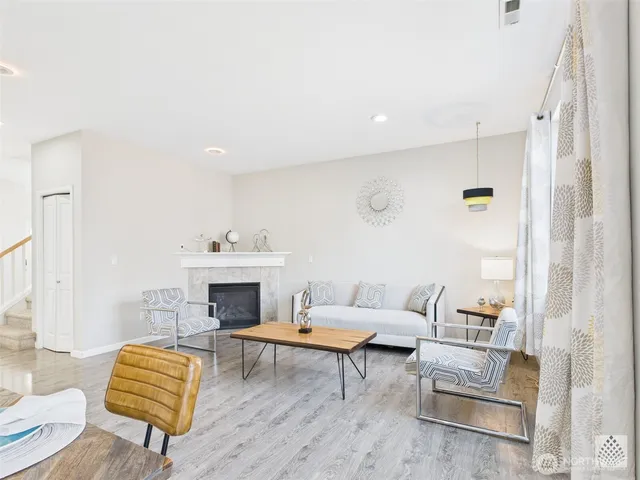 a open kitchen with a table and chairs