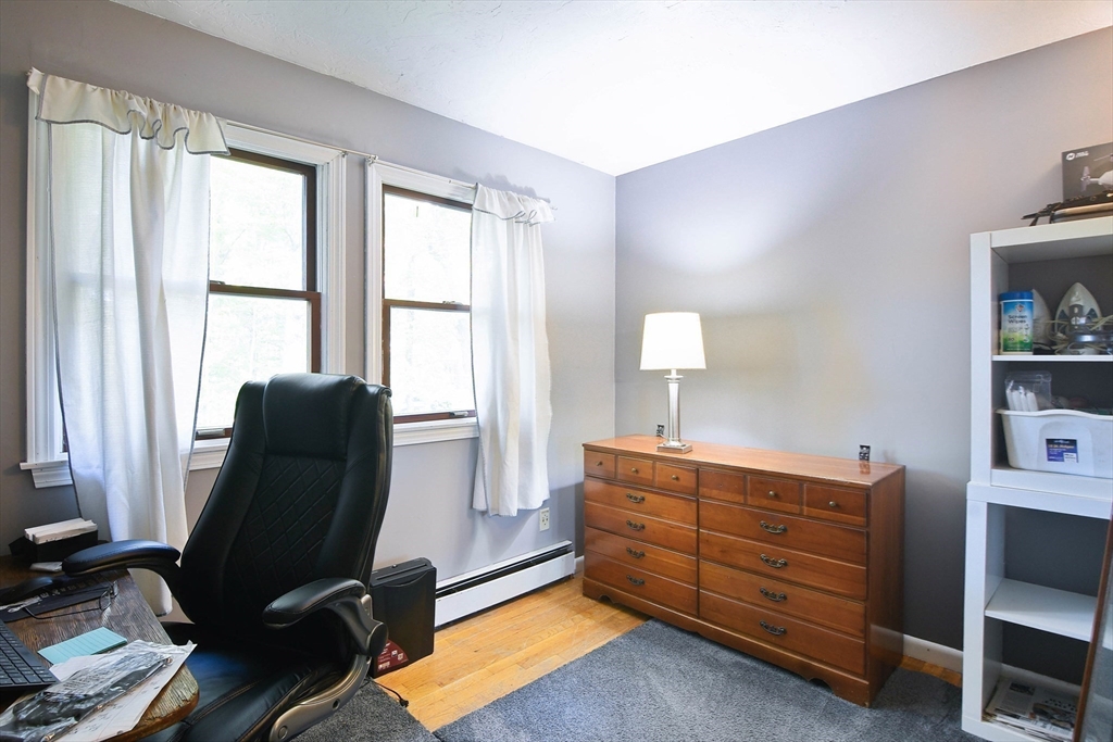 85 Paddock Road Rutland, MA 01543 - Photo 25 of 42 a livingroom with workspace and a window