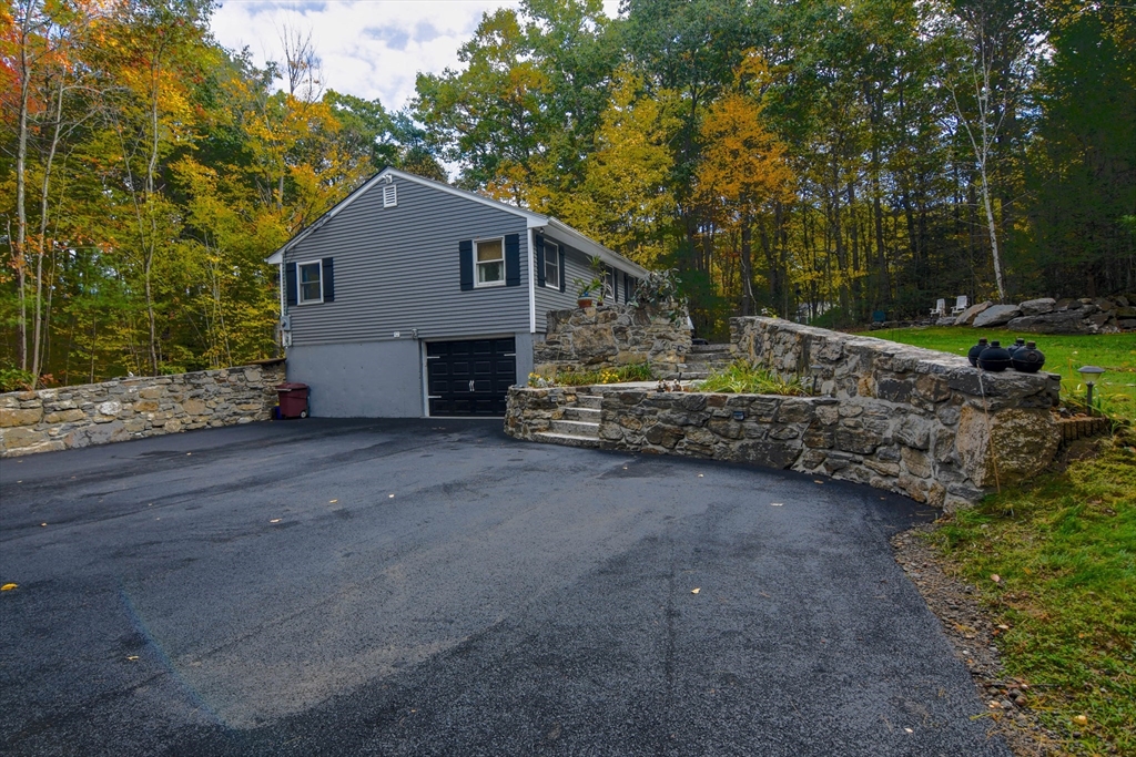 85 Paddock Road Rutland, MA 01543 - Photo 3 of 42 a view of backyard of house