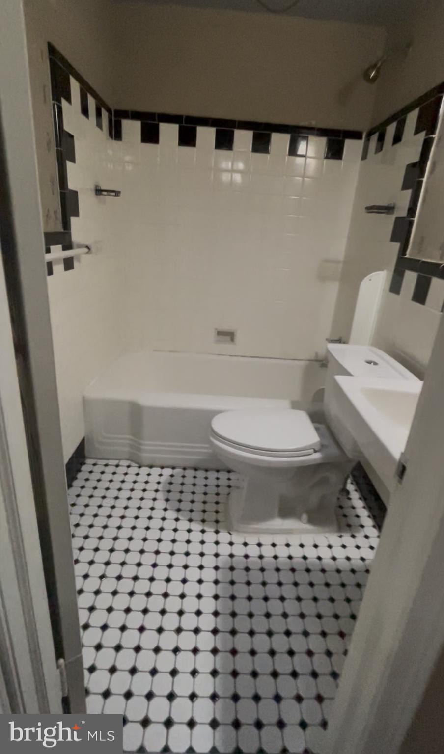 4104 North I Street Philadelphia, PA 19124 - Photo 16 of 16 a bathroom with a sink a toilet and a shower