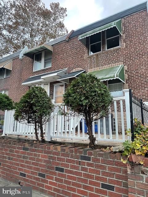 4104 North I Street Philadelphia, PA 19124 - Photo 3 of 16 a front view of a house with a garden