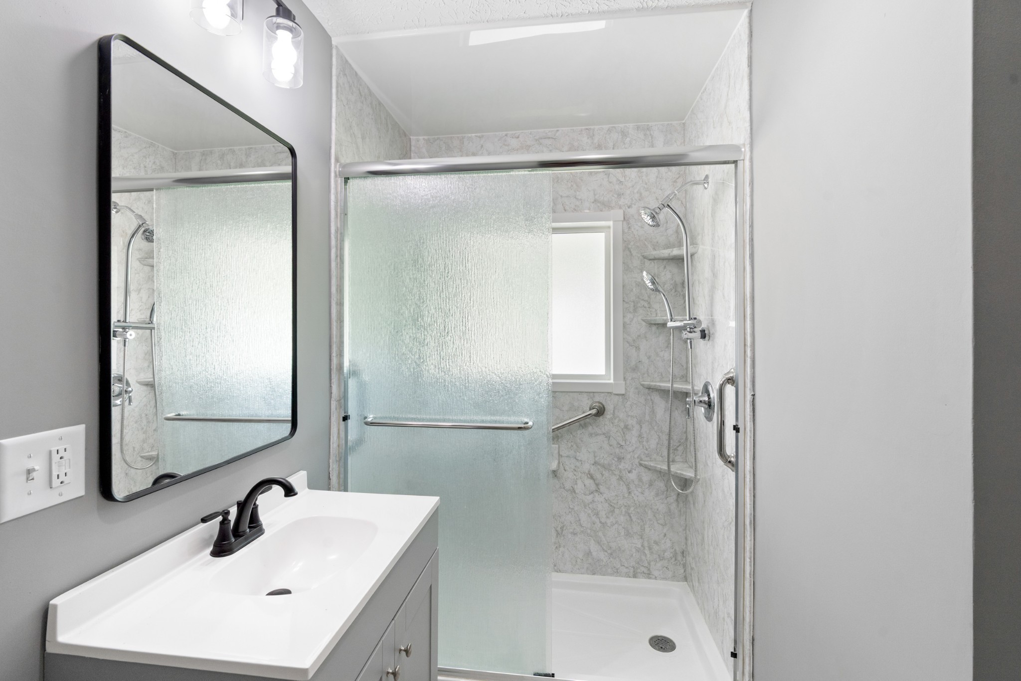 1503 5th Avenue West Springfield, TN 37172 - Photo 19 of 43 a bathroom with a sink mirror and shower