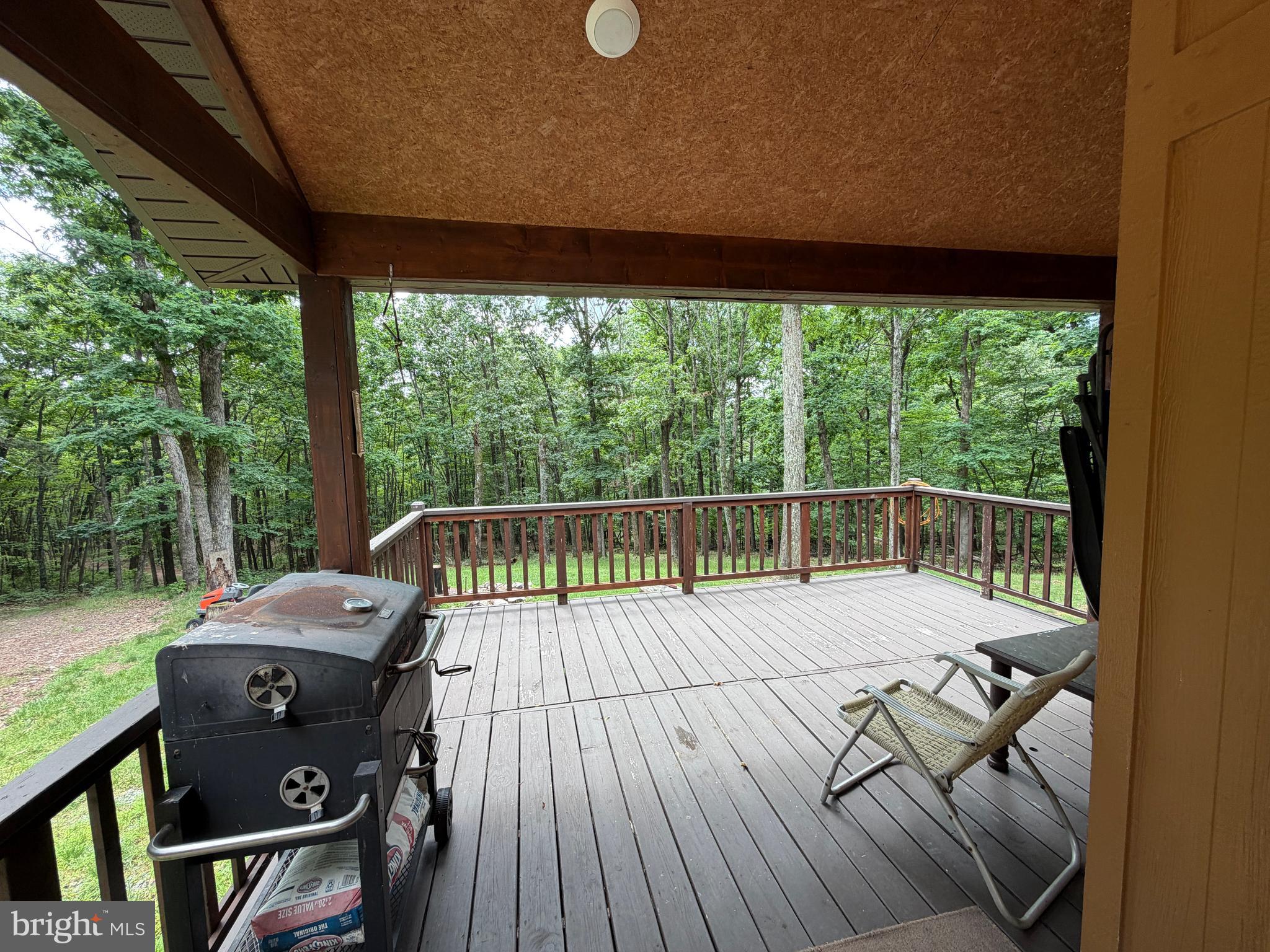 1419 Paul's Woods Road Delray, WV 26714 - Photo 65 of 105 a view of balcony with wooden floor and seating space