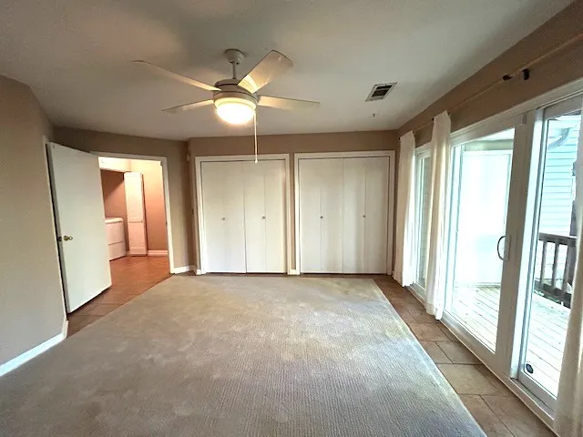 a bathroom with a tub and a shower