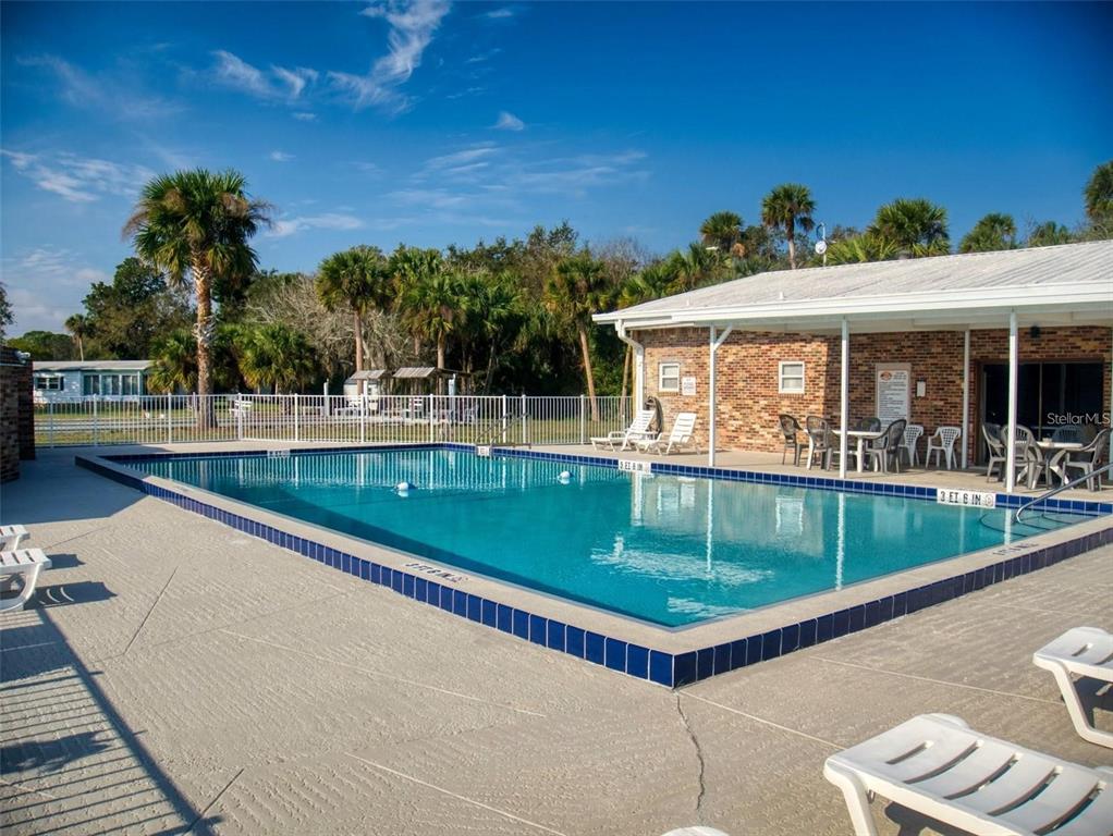 160 Red Bass Lane Edgewater, FL 32141 - Photo 3 of 10 a view of a house with a swimming pool