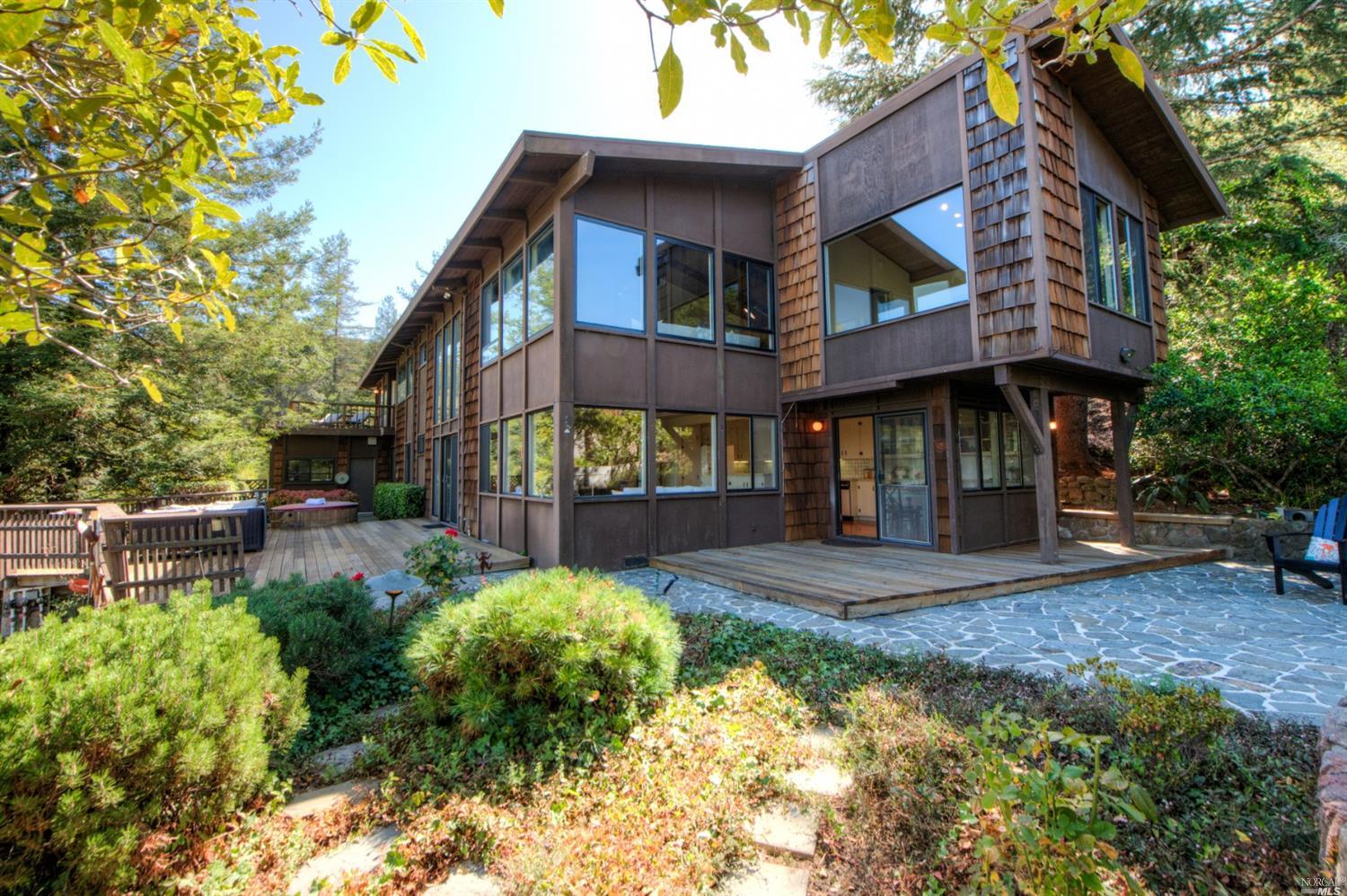 142 Upland Road Kentfield, CA 94904 - Photo 1 of 1 a view of an house with backyard and sitting area