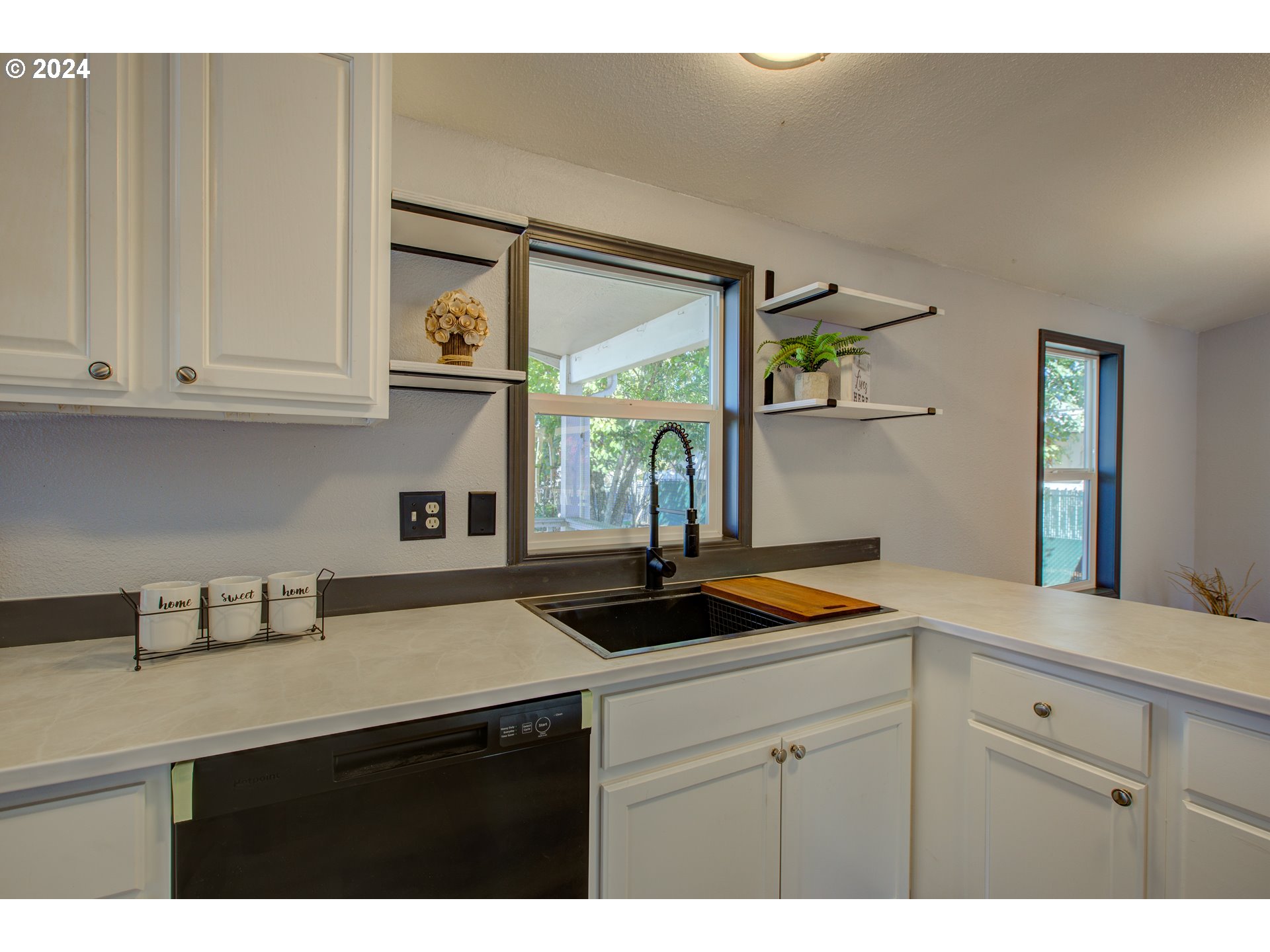 2438 Austin Road Roseburg, OR 97471 - Photo 20 of 48 a kitchen with a sink and cabinets