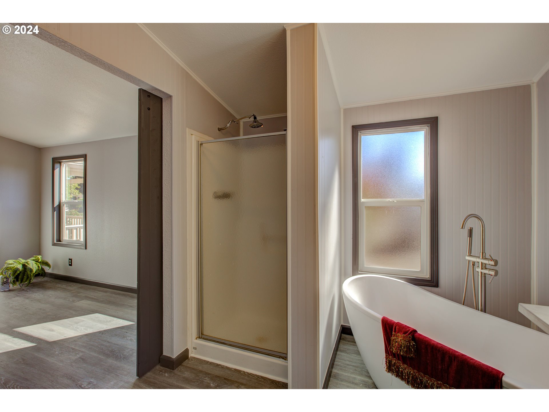 2438 Austin Road Roseburg, OR 97471 - Photo 33 of 48 a bathroom with a sink a mirror and a shower