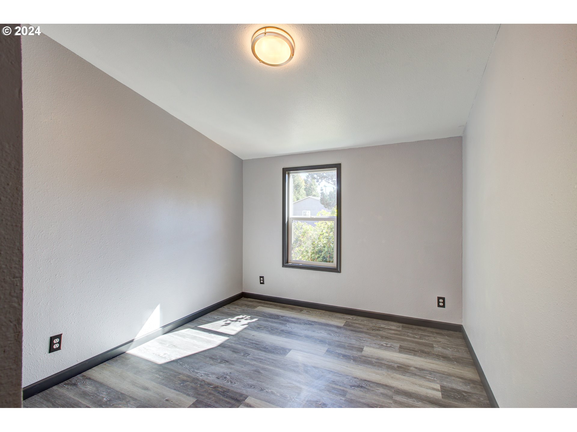 2438 Austin Road Roseburg, OR 97471 - Photo 34 of 48 a view of an empty room with a window