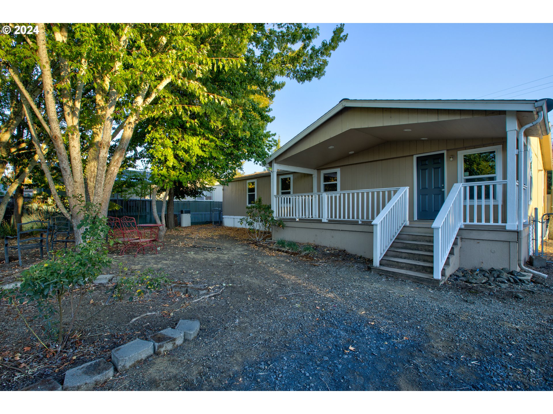 2438 Austin Road Roseburg, OR 97471 - Photo 40 of 48 a view of a house with a yard
