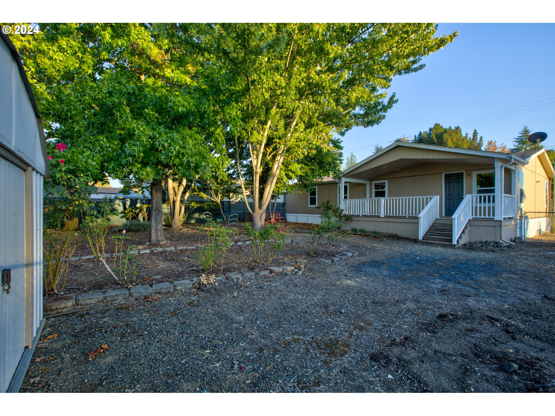 2438 Austin Road Roseburg, OR 97471 - Photo 41 of 48 a view of a house with a yard