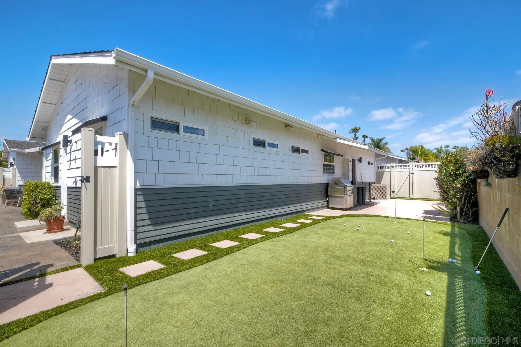 1011 Knowles Avenue Carlsbad, CA 92008 - Photo 26 of 42 a view of a house with a swimming pool