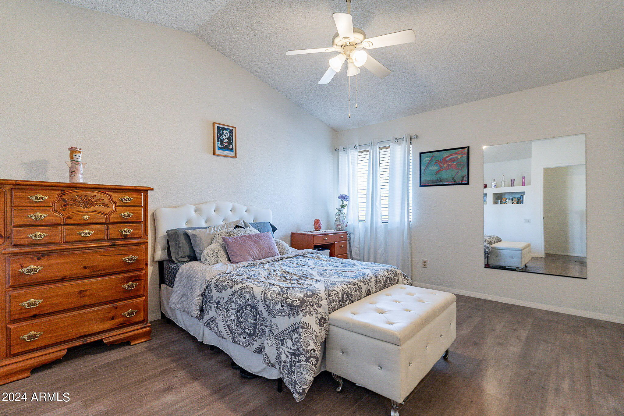 170 East Guadalupe Road, Unit 67 Gilbert, AZ 85234 - Photo 14 of 29 a bedroom with a bed and a couch